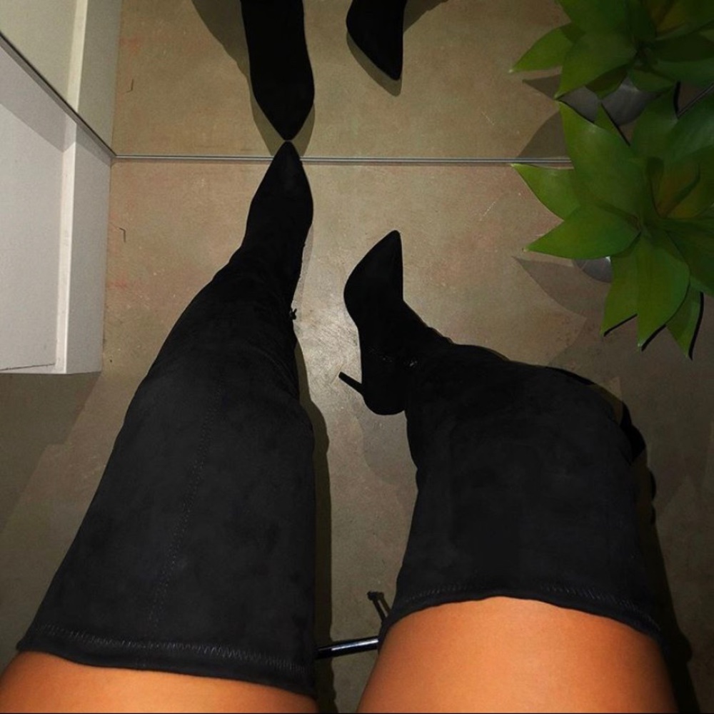 Thigh high black boots